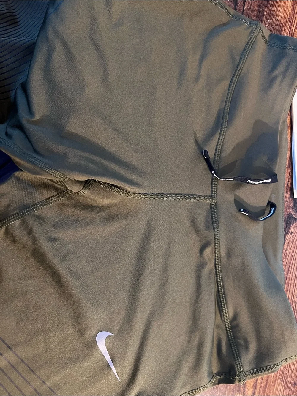 Nike Woman’s Olive Performance Leggings with Swoosh size L
